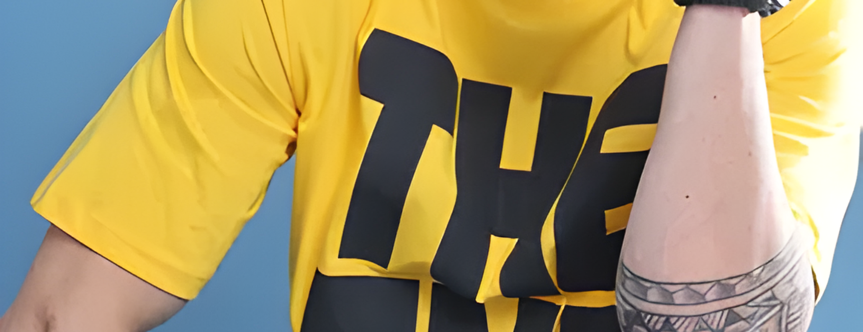 Yellow t-shirt with black text